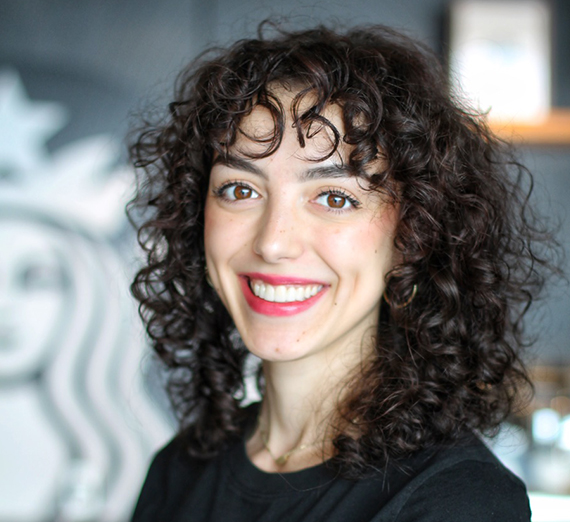 Wedding party poses with Gonzaga flag.